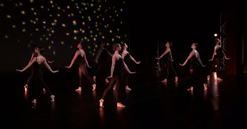 A group dancing on the stage.