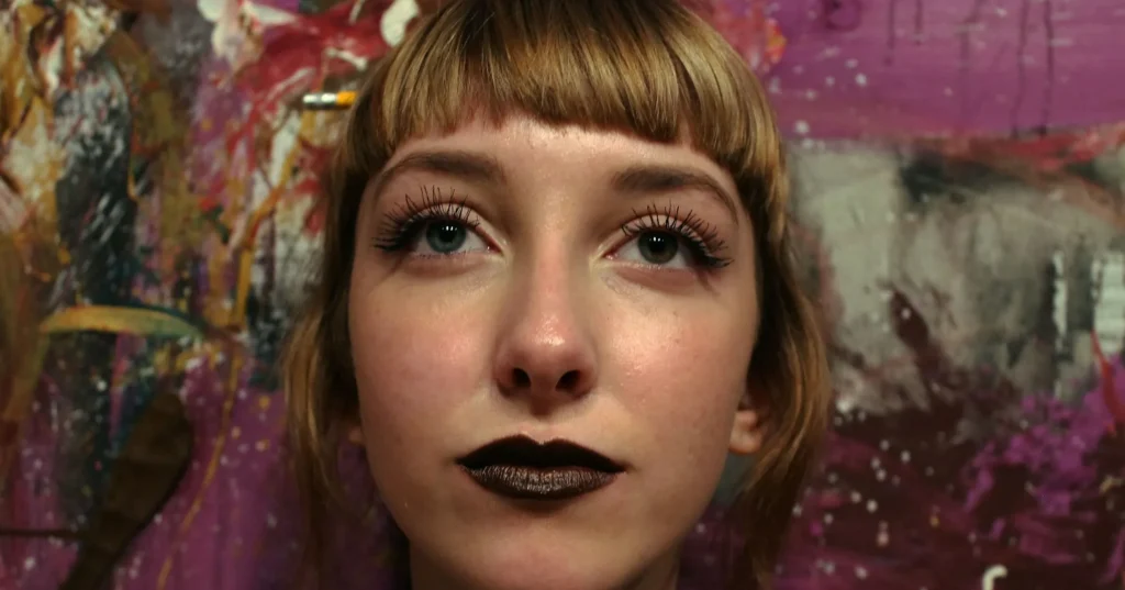 A girl having bob with bangs.