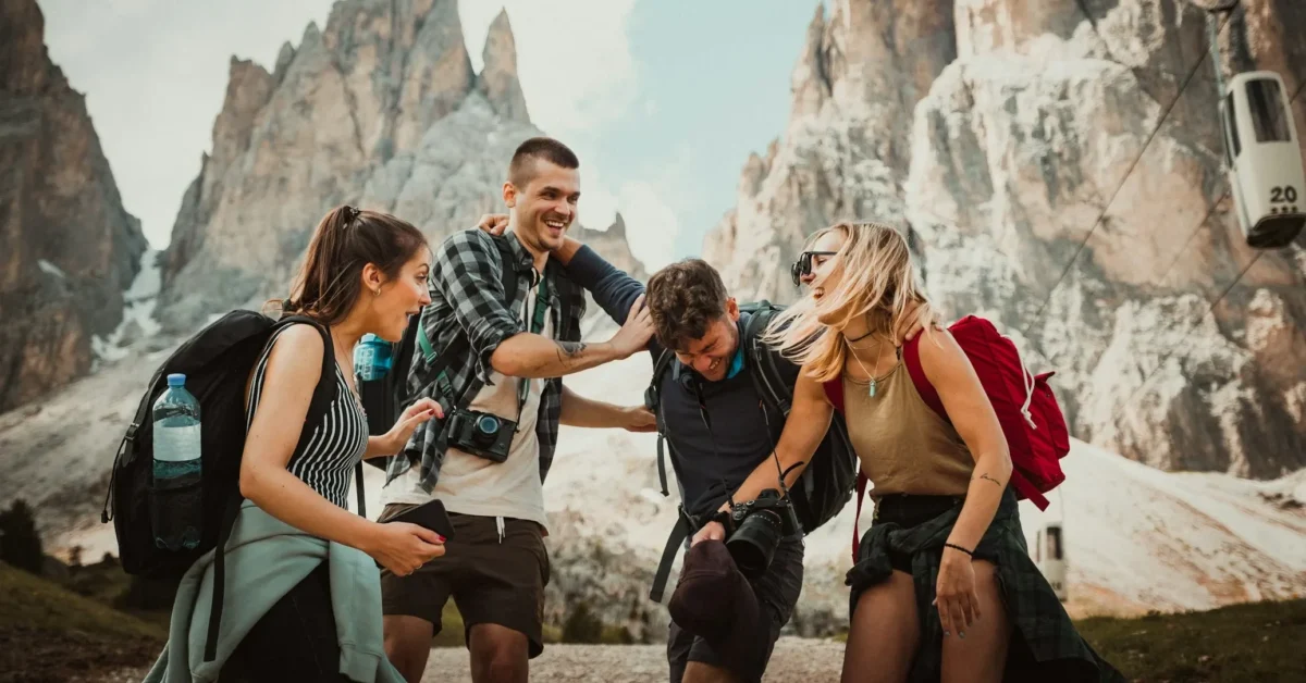 A group of friend laughing and enjoying on some sort of tour.