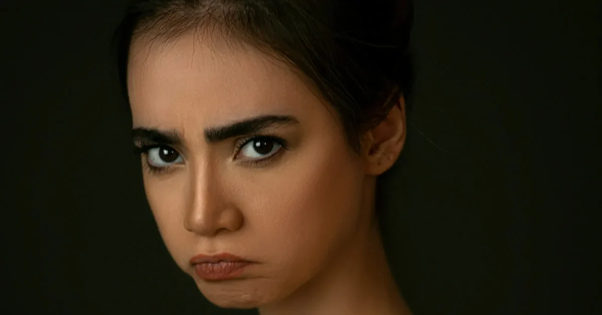 A girl making a face due to lack of confidence.