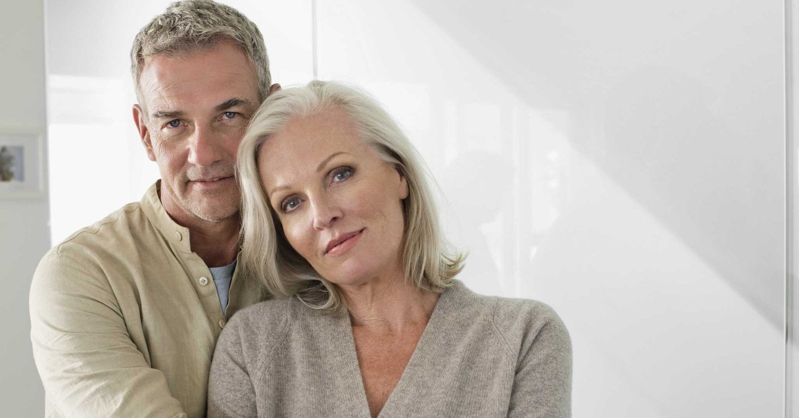 A man and woman embrace in a white room, symbolizing love and commitment after 25 years of marriage. What am I entitled to?