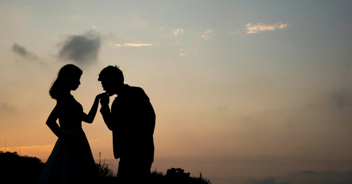 A bride and groom's silhouette against a sunset, representing the journey of "How to Rekindle Your Marriage.