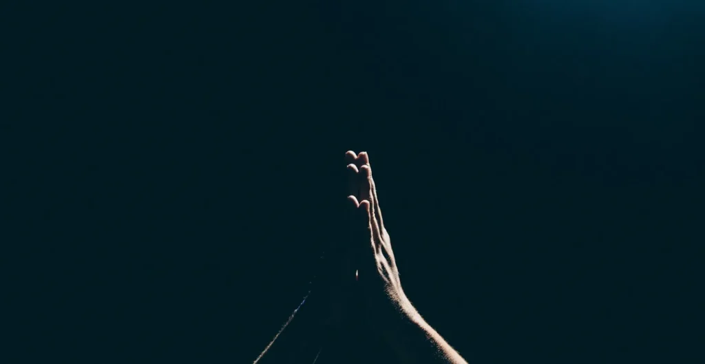 Someone raised their hands for praying.