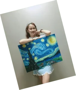 A girl holding a picture.