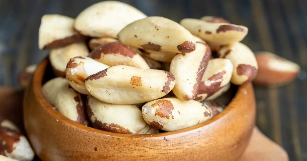 Benefits of brazil nuts as a bowl is full of brazil nuts.