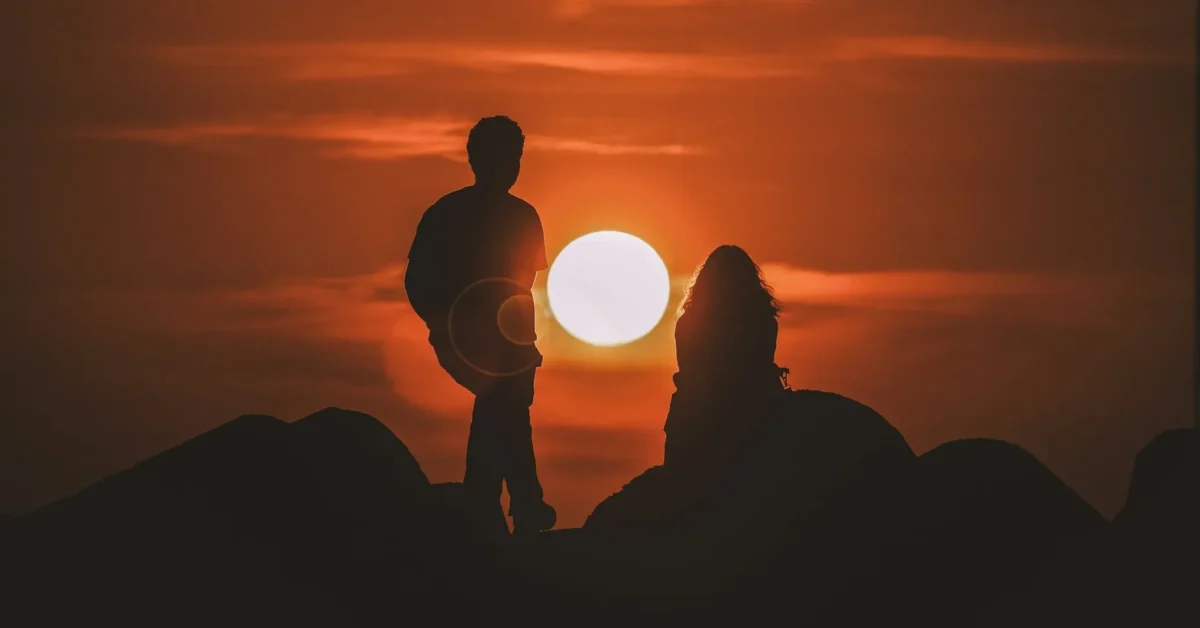 Couple in sunset. Fake love damages your life.
