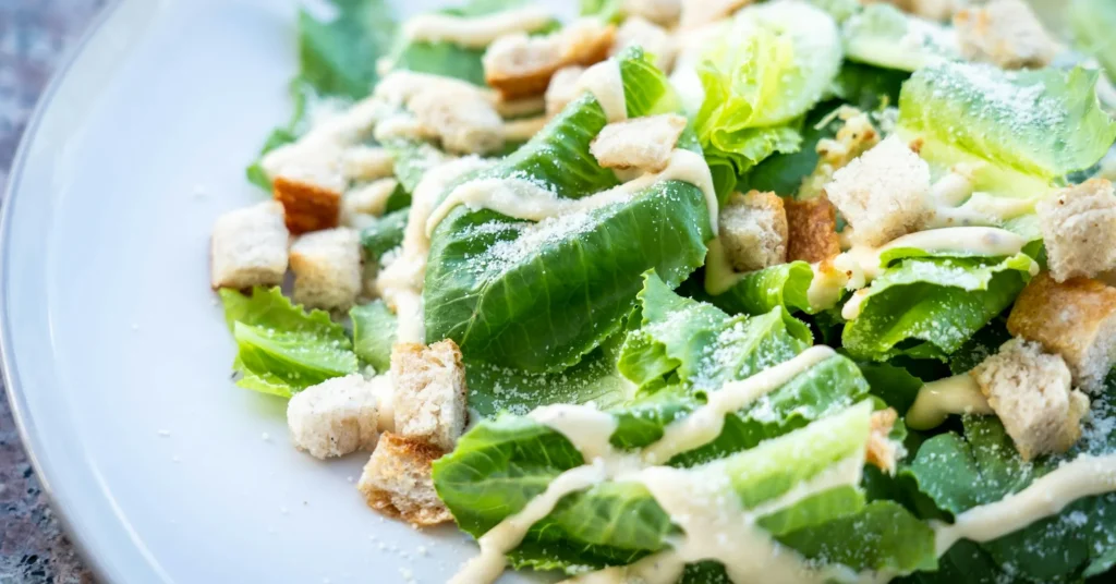 A plate of healthy diet with fat free dressing of salad.